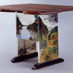 young woman's hand holding a flower