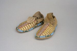 Artist formerly known [Tsitsistas/Suhtai (Cheyenne)], Pair of Men's Beaded and Quilled Moccasins , ca. 1880. Leather, beads, and quills, 4 x 10 1/2 in. Collection of Shelburne Museum, gift of Ogden M. Pleissner. 1961 - 182.7. Photography by Pitkin Studio, Rockford, IL, USA.