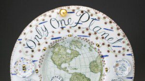 Mara Superior, Only One Planet Earth,2019. High-fired porcelain, ceramic oxides, underglaze, glaze, and gold leaf, 16 x 16 x 11/2 in. Courtesy of artist and Ferrin Contemporary. John Polak Photography.